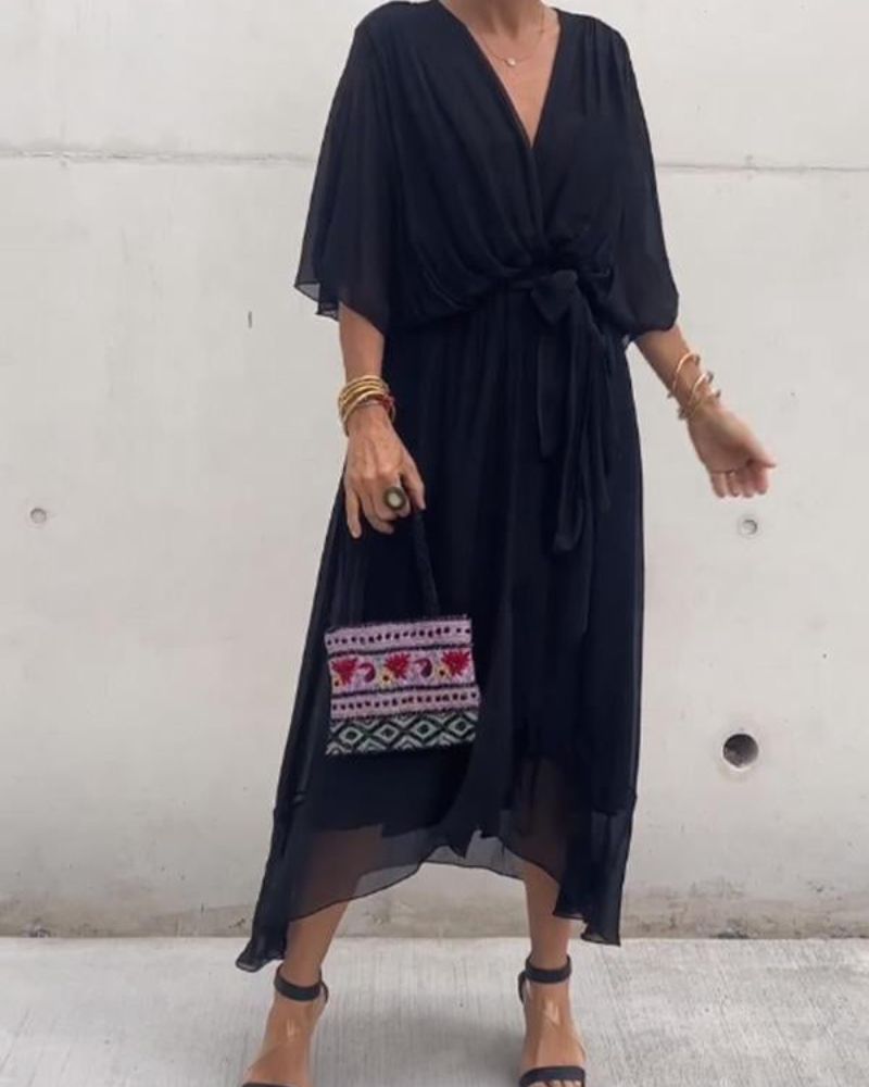 Abito da donna Cristi - Elegante abito avvolgente con maniche a pipistrello e orlo asimmetrico