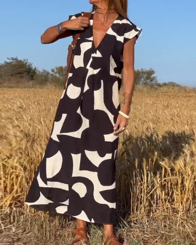Abito ampio da donna Sita - Stampa astratta in bianco e nero con scollatura a V profonda