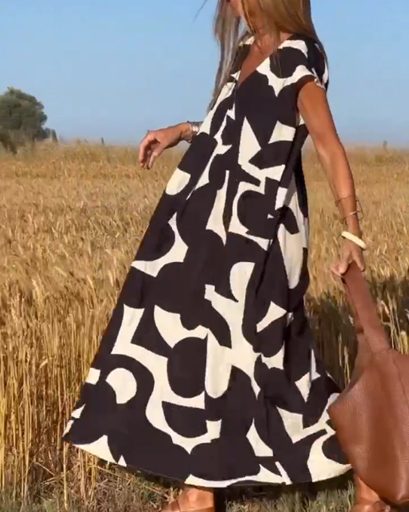 Abito ampio da donna Sita - Stampa astratta in bianco e nero con scollatura a V profonda