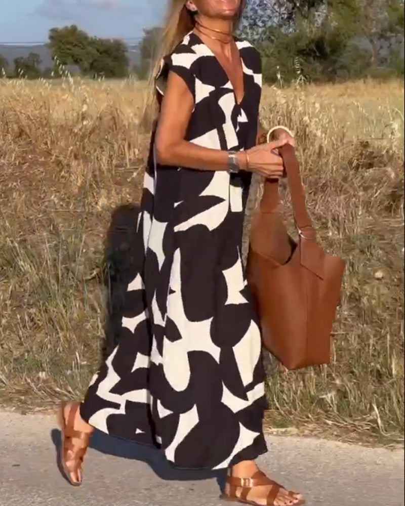 Abito ampio da donna Sita - Stampa astratta in bianco e nero con scollatura a V profonda