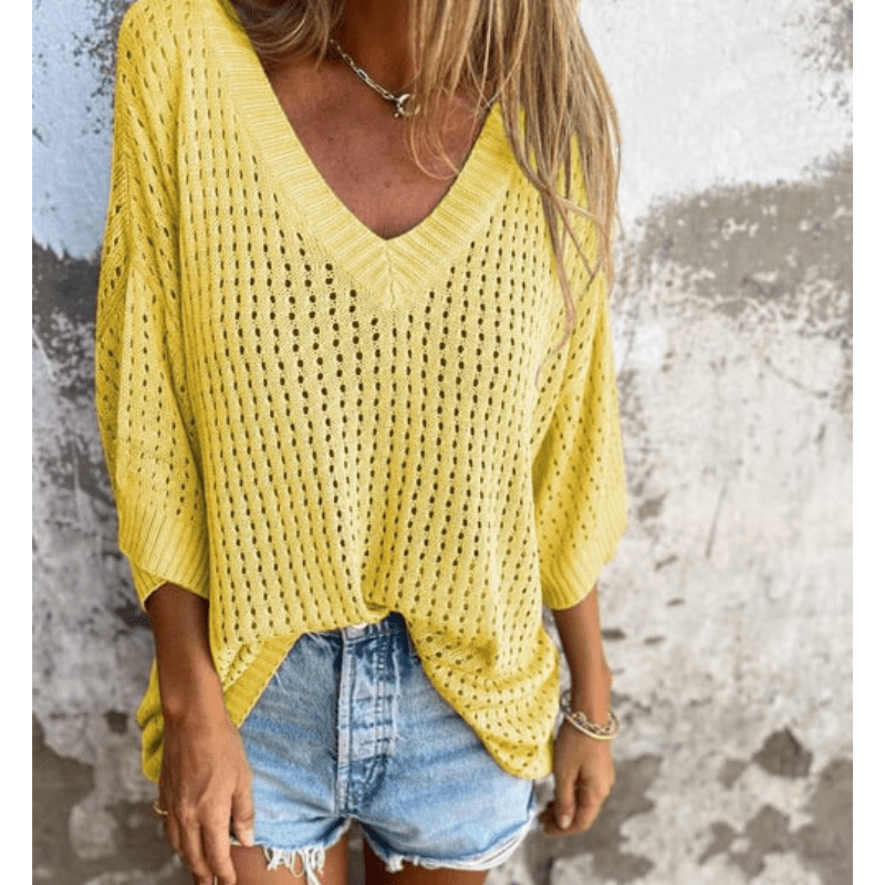 Top leggero traforato da donna Aria - Vestibilità fluida, maniche a 3/4 e design traspirante di Looksy