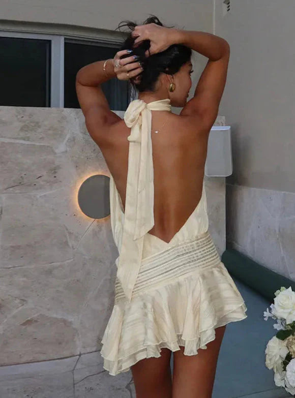 Abito corto da donna Irene - Abito in pizzo con scollo all'americana, schiena scoperta e taglio aderente