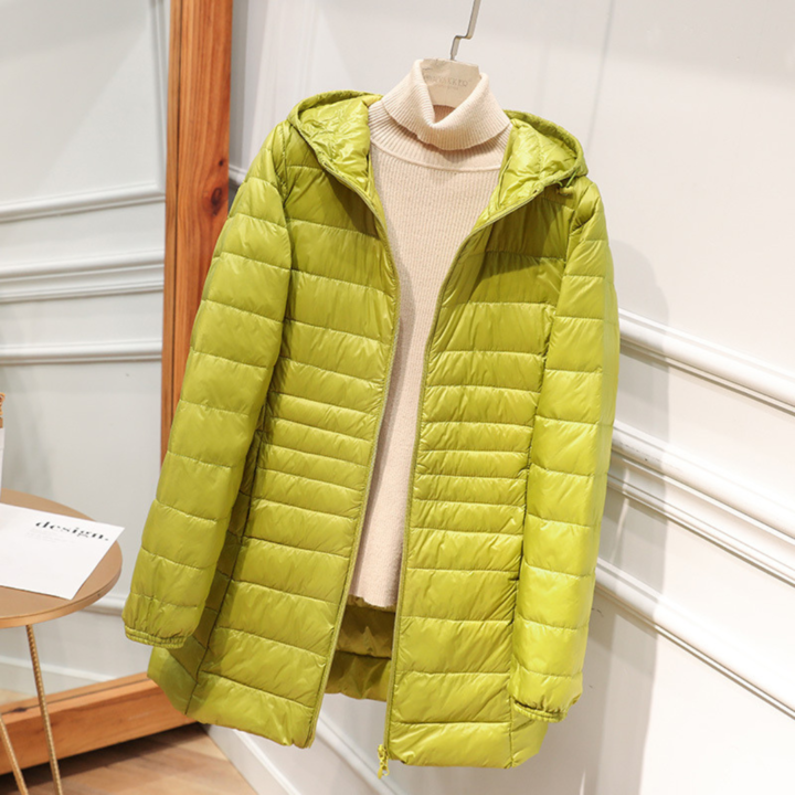Giacca da donna Nora – Giacca impermeabile ultraleggera con cappuccio staccabile ed eleganti pieghe