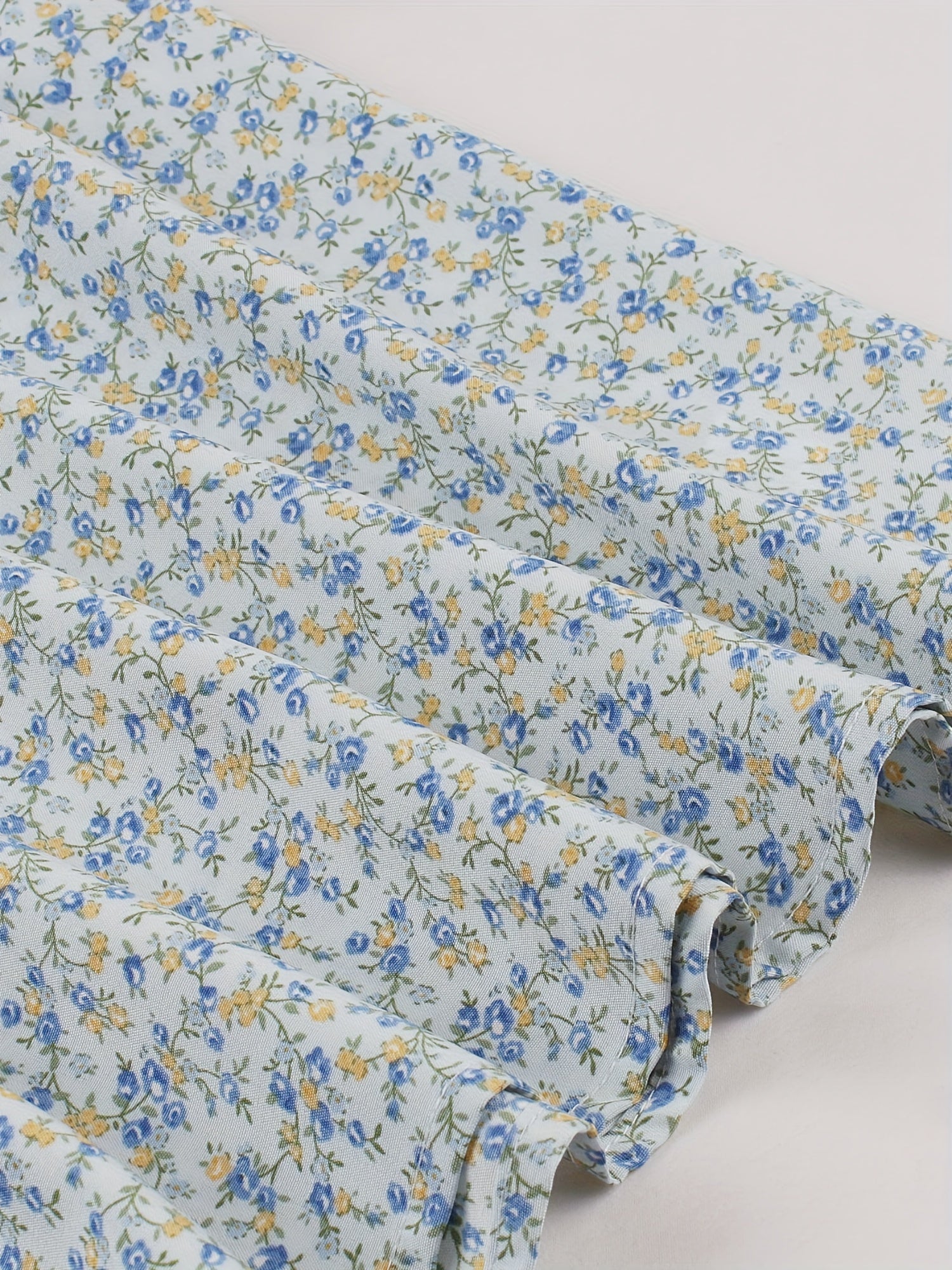 Robe d'Été Lily pour Femme – Robe Midi Sans Manches à Imprimé Floral et Coupe Élégante