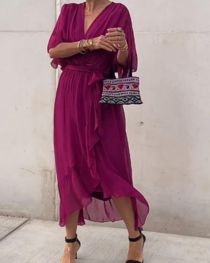 Abito da donna Cristi - Elegante abito avvolgente con maniche a pipistrello e orlo asimmetrico