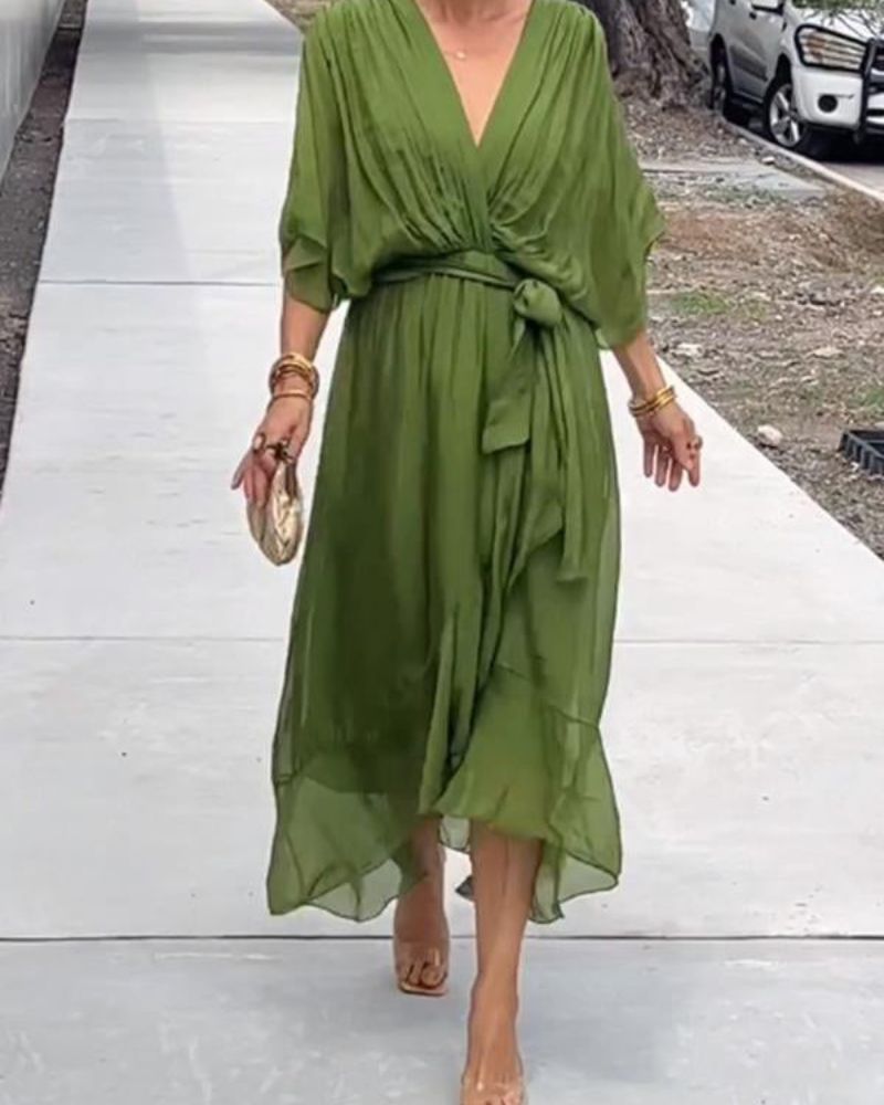 Abito da donna Cristi - Elegante abito avvolgente con maniche a pipistrello e orlo asimmetrico