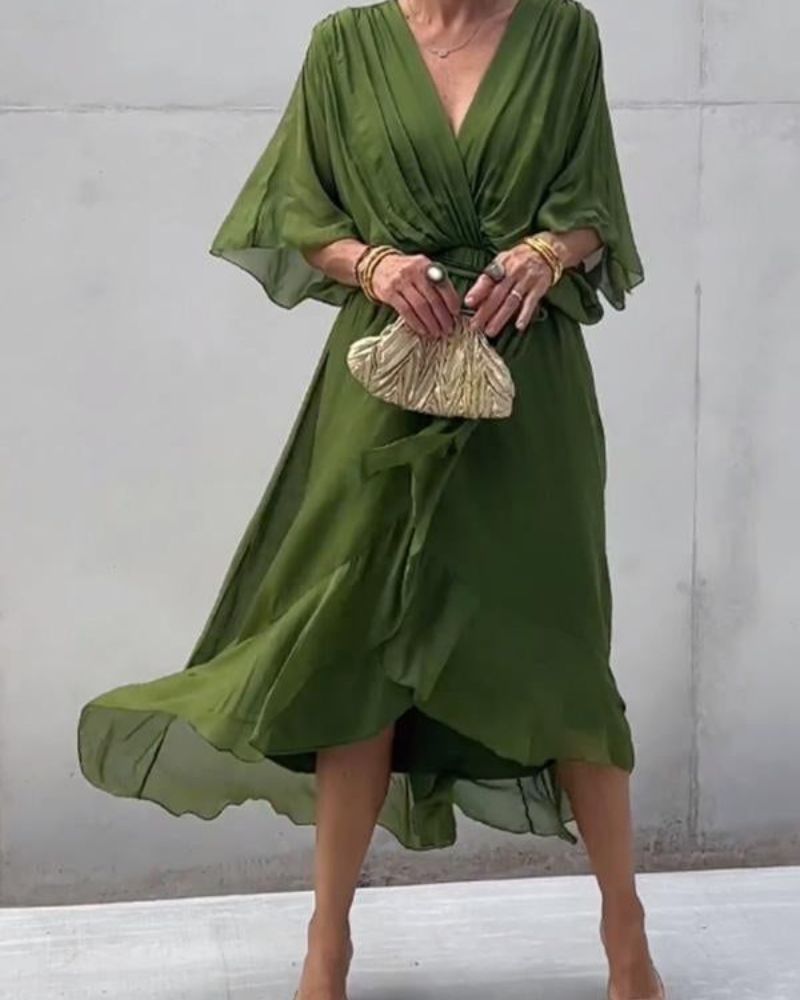 Abito da donna Cristi - Elegante abito avvolgente con maniche a pipistrello e orlo asimmetrico