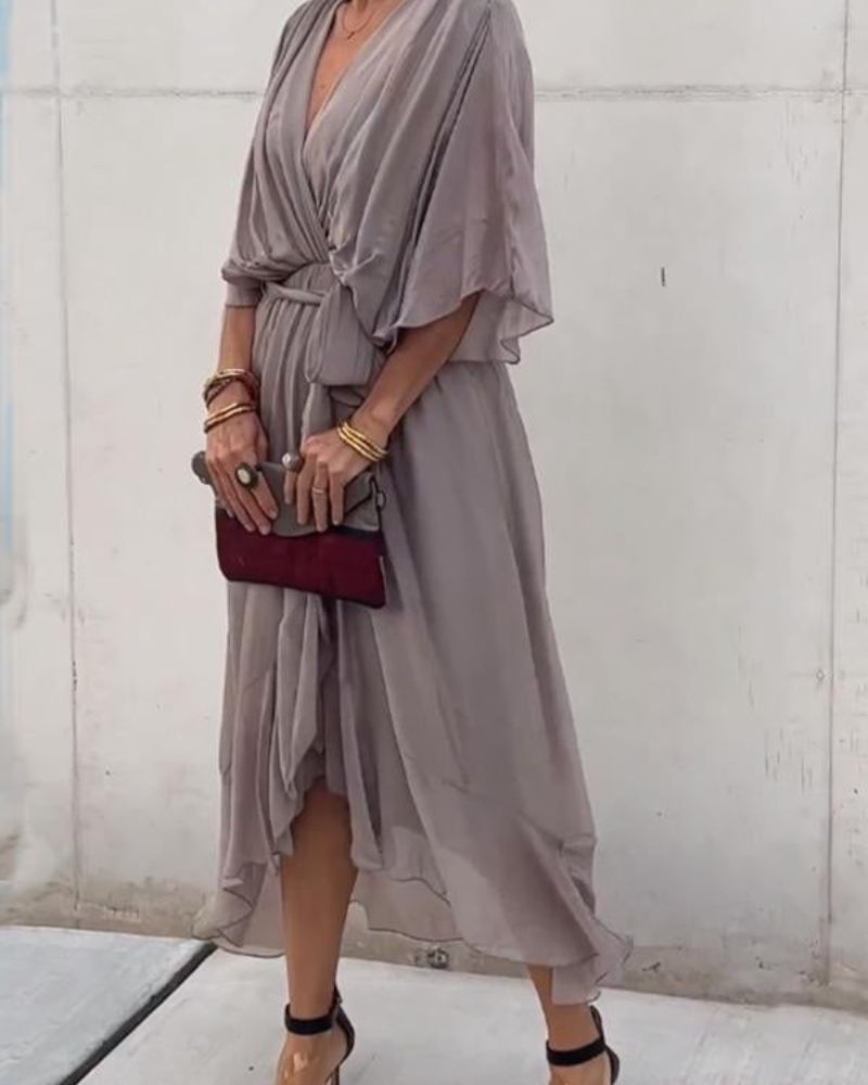 Abito da donna Cristi - Elegante abito avvolgente con maniche a pipistrello e orlo asimmetrico
