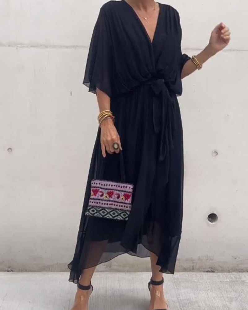 Abito da donna Cristi - Elegante abito avvolgente con maniche a pipistrello e orlo asimmetrico
