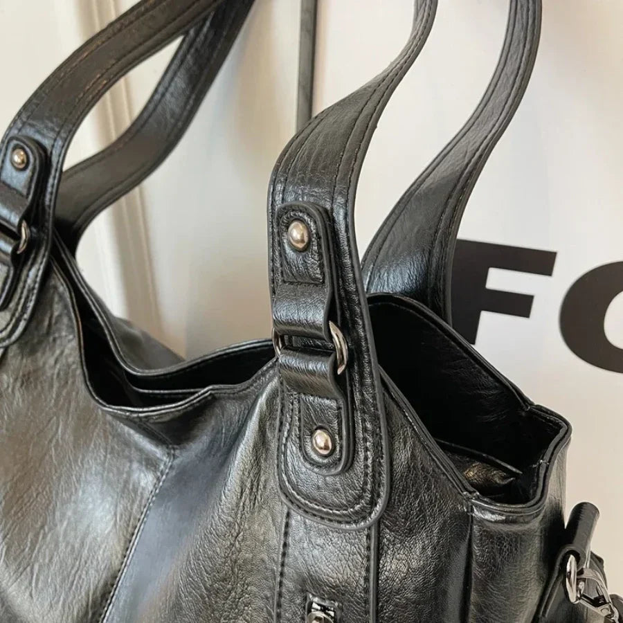Borsa a tracolla da donna Dakota - Elegante borsa in pelle con tracolla regolabile e design spazioso