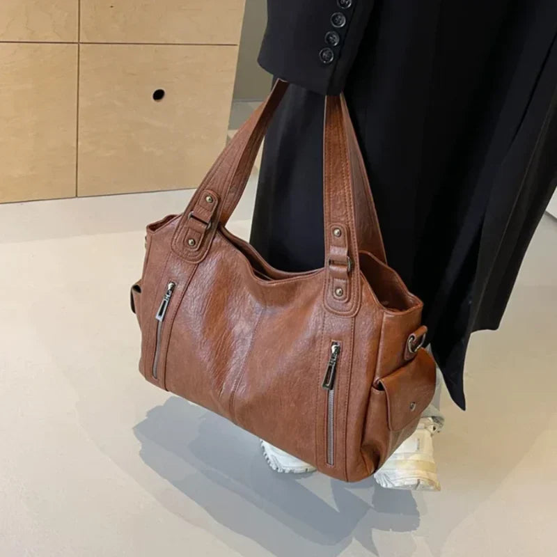 Borsa a tracolla da donna Dakota - Elegante borsa in pelle con tracolla regolabile e design spazioso
