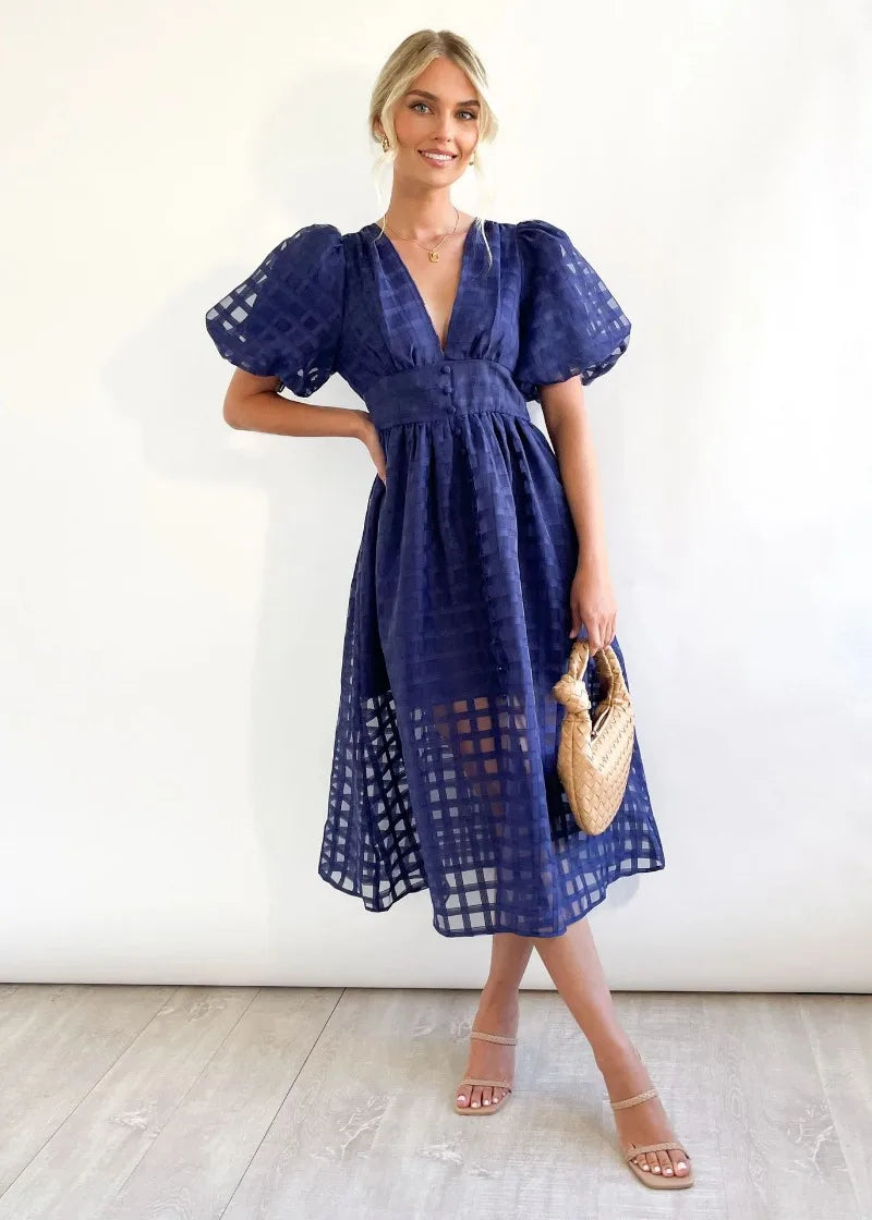 Abito midi da donna Mylene - Elegante abito a quadri con volume e colori vivaci