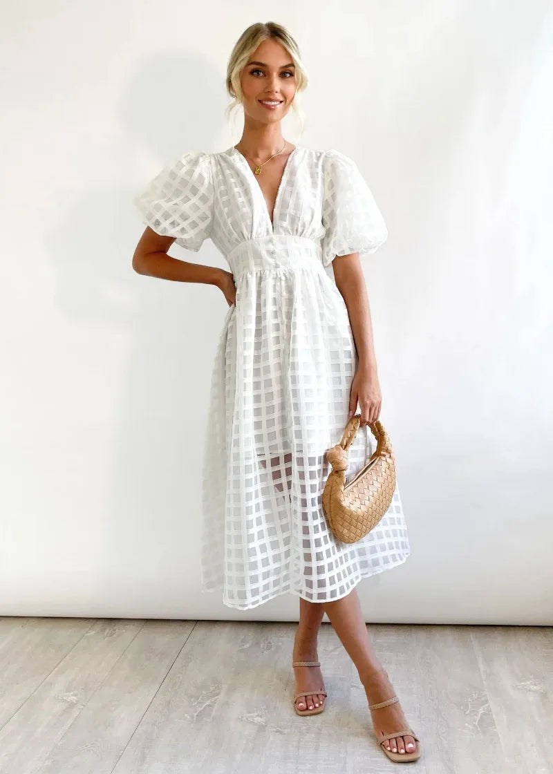 Abito midi da donna Mylene - Elegante abito a quadri con volume e colori vivaci