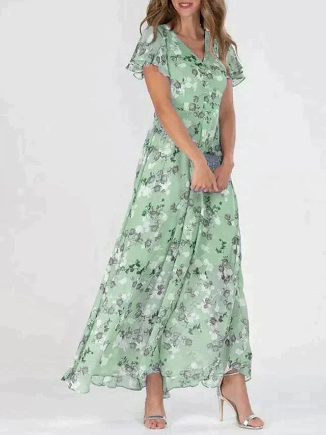 Abito lungo da donna Irene: scollo a V lusinghiero, stampa floreale leggera e vestibilità comoda