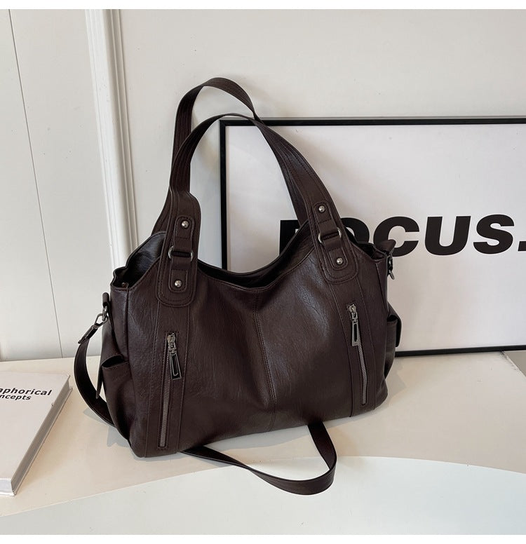 Borsa a tracolla da donna Dakota - Elegante borsa in pelle con tracolla regolabile e design spazioso