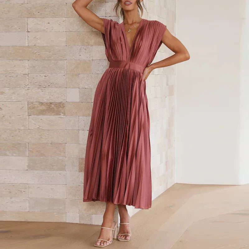 Abito da donna Daliah - Elegante abito plissettato con scollatura profonda e stile versatile