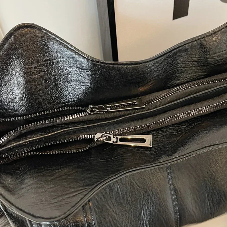 Borsa a tracolla da donna Dakota - Elegante borsa in pelle con tracolla regolabile e design spazioso