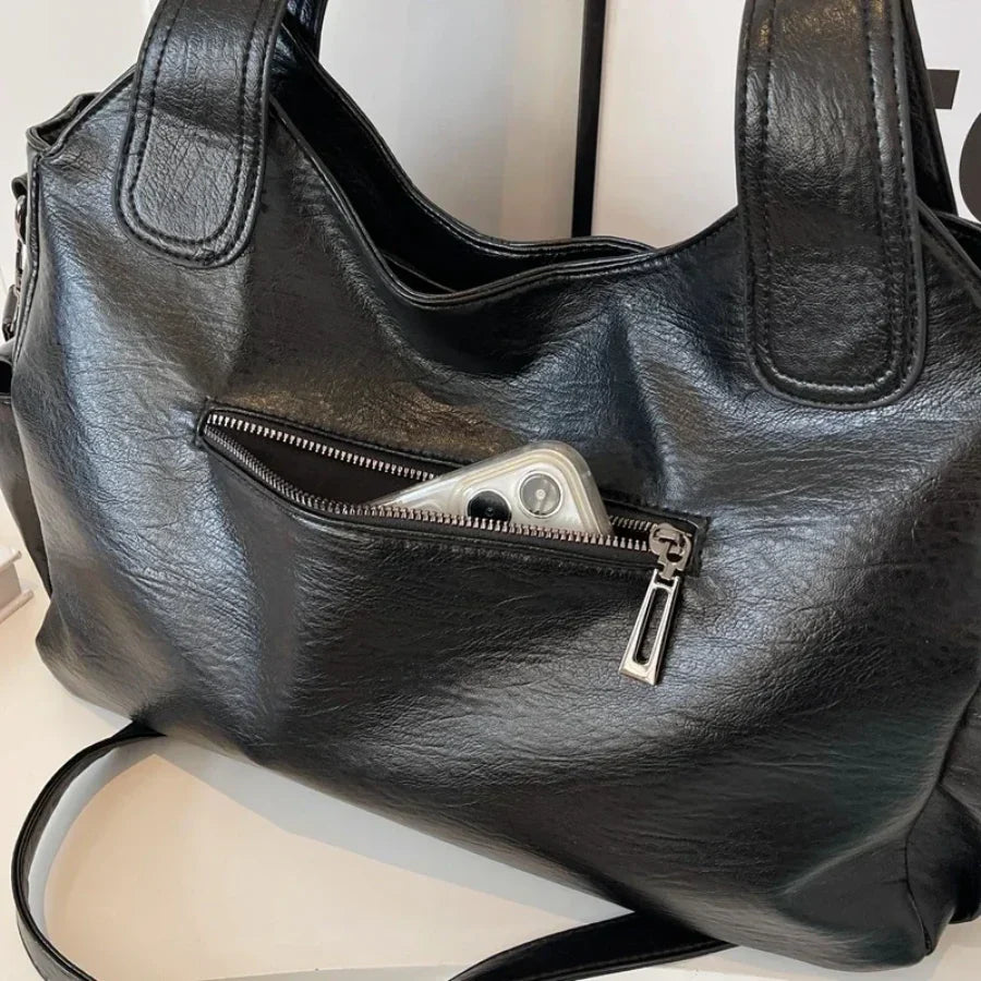 Borsa a tracolla da donna Dakota - Elegante borsa in pelle con tracolla regolabile e design spazioso