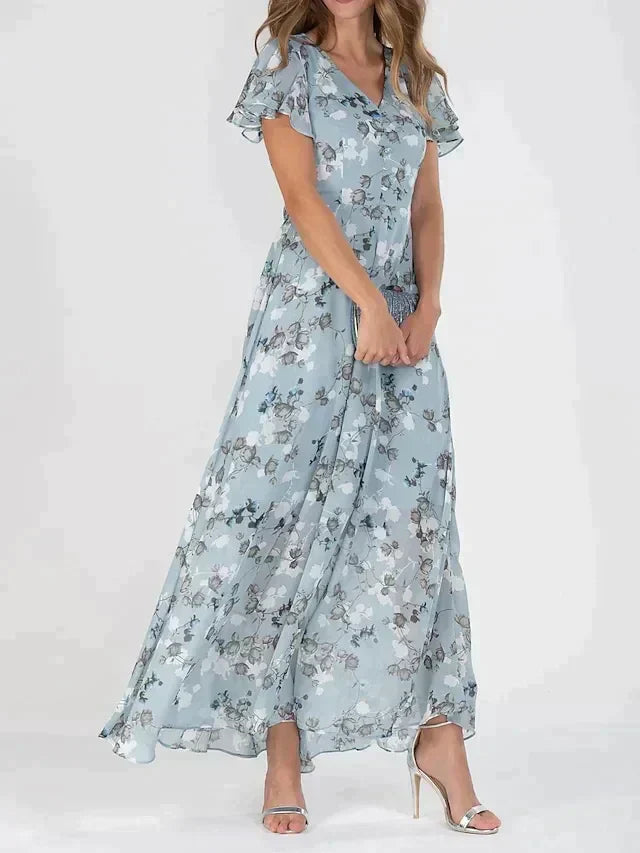 Abito lungo da donna Irene: scollo a V lusinghiero, stampa floreale leggera e vestibilità comoda