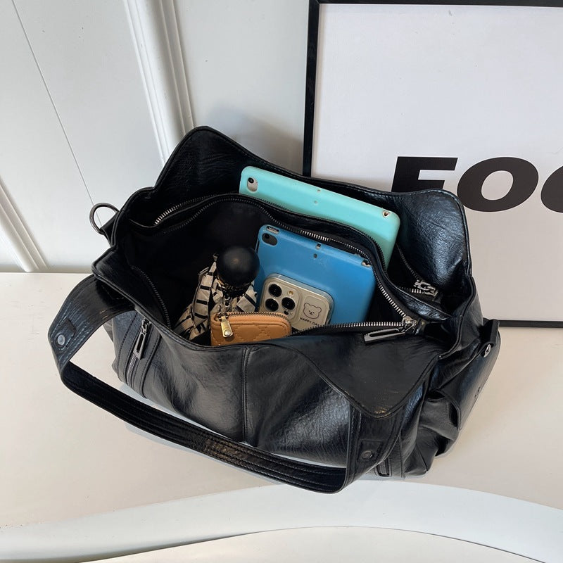 Borsa a tracolla da donna Dakota - Elegante borsa in pelle con tracolla regolabile e design spazioso