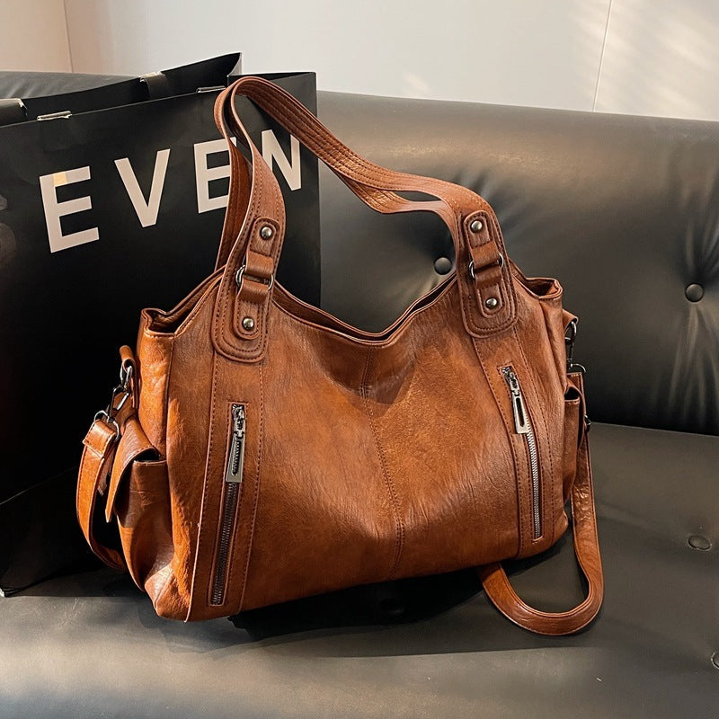 Borsa a tracolla da donna Dakota - Elegante borsa in pelle con tracolla regolabile e design spazioso