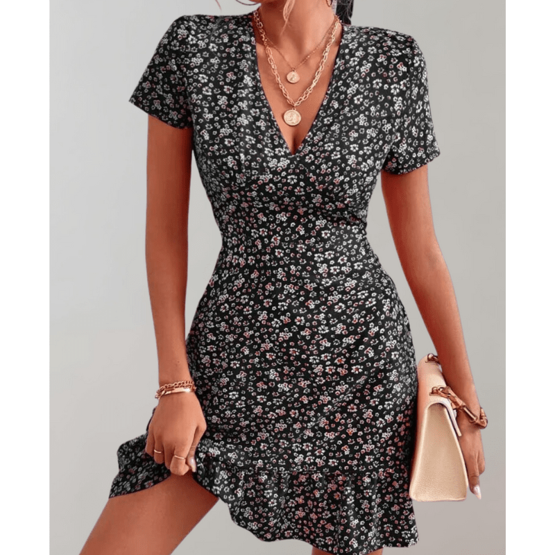 Abito floreale da donna Daria - Orlo fluido, scollo a V e vita discreta di Looksy