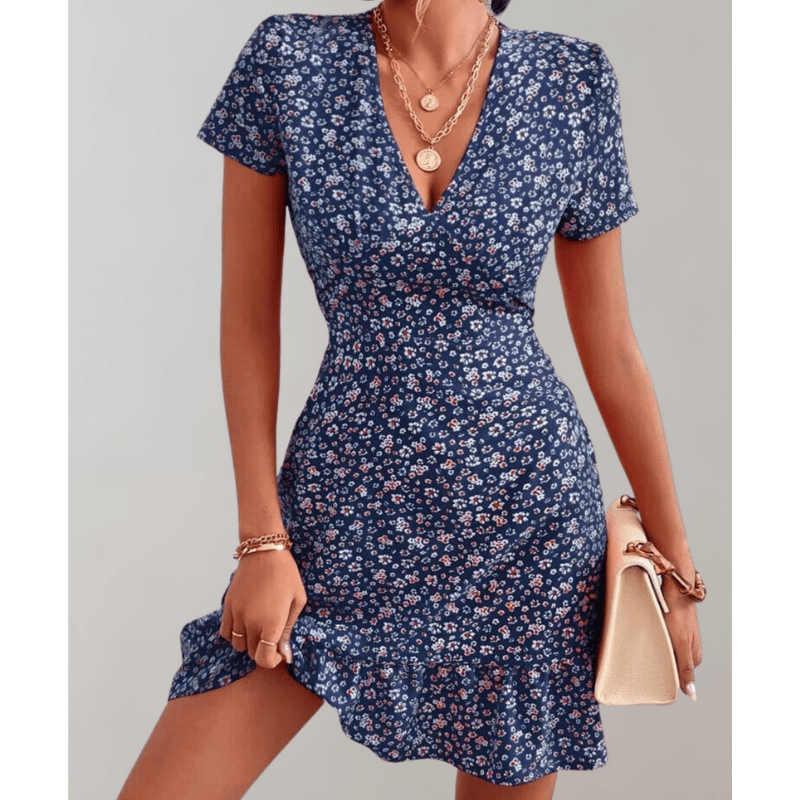 Abito floreale da donna Daria - Orlo fluido, scollo a V e vita discreta di Looksy