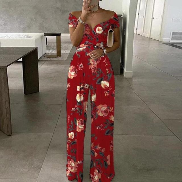 Tuta da donna Leah - Elegante tuta con spalle scoperte, gambe larghe e cintura in vita