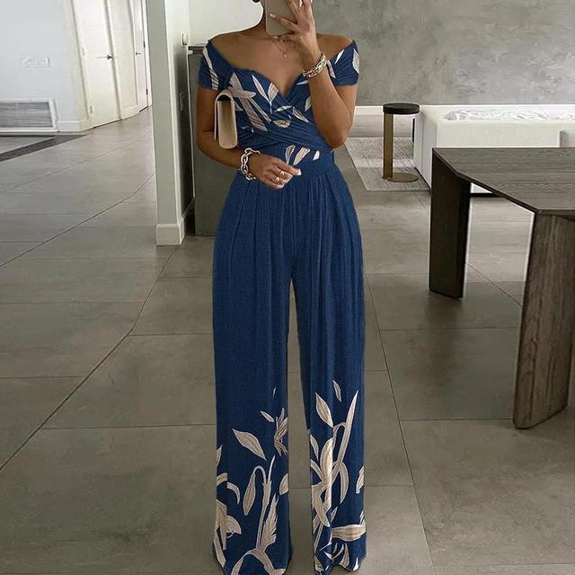 Tuta da donna Lilibeth - Elegante tuta a gamba larga con spalle scoperte e cintura