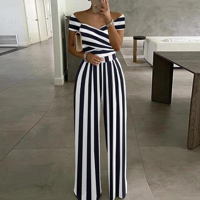 Tuta da donna Lilibeth - Elegante tuta a gamba larga con spalle scoperte e cintura