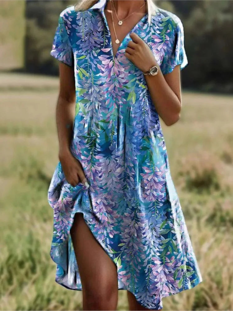 Abito da donna Jeanne: elegante abito con scollo a V e bottoni, vestibilità aderente e motivo floreale senza tempo