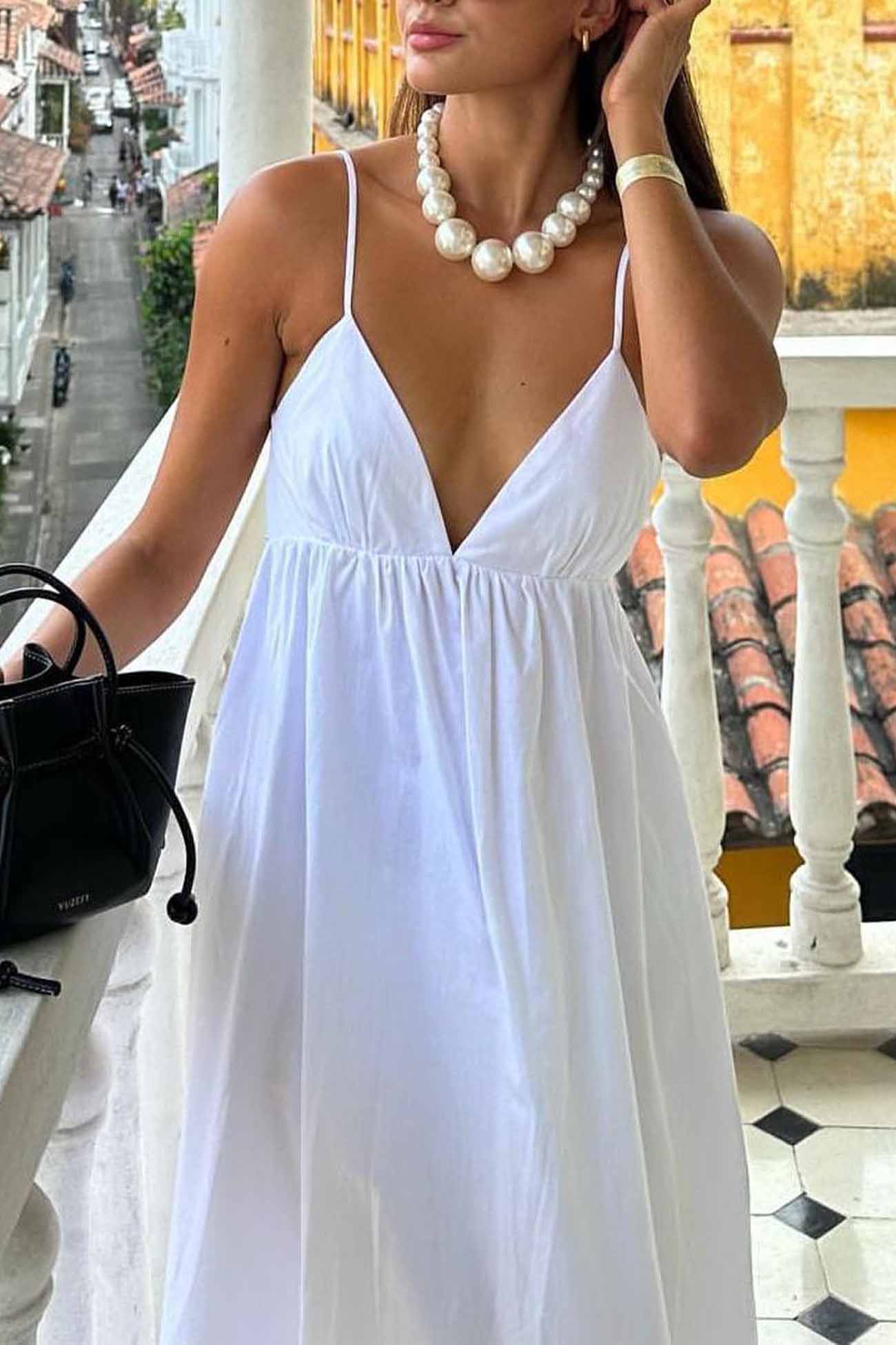 Abito midi da donna Jannie: abito bianco con scollo a V e schiena scoperta per un'eleganza estiva