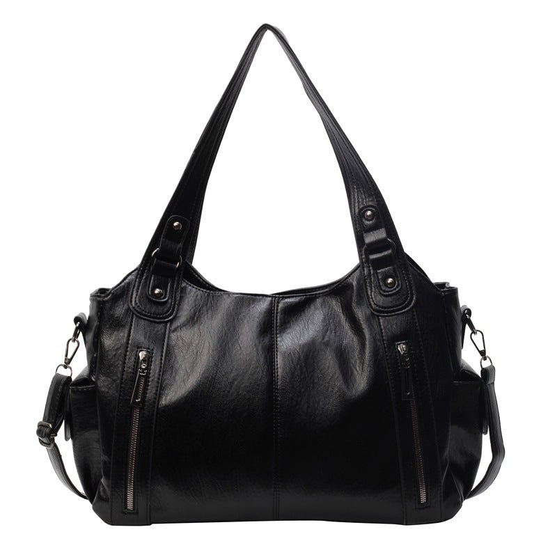 Borsa a tracolla da donna Dakota - Elegante borsa in pelle con tracolla regolabile e design spazioso
