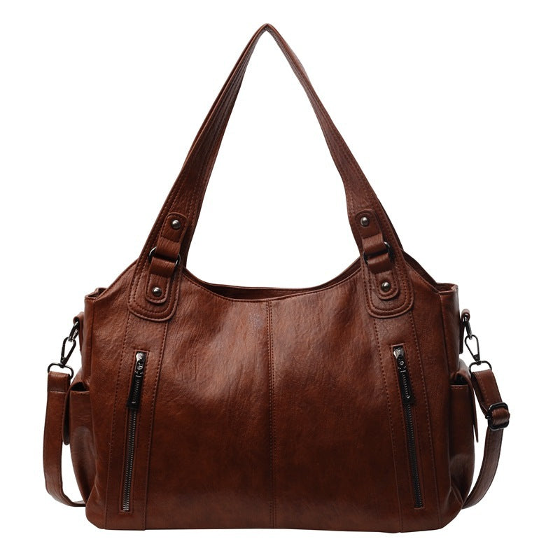 Borsa a tracolla da donna Dakota - Elegante borsa in pelle con tracolla regolabile e design spazioso