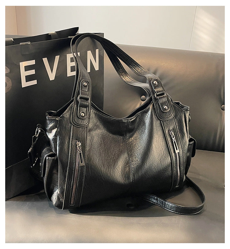 Borsa a tracolla da donna Dakota - Elegante borsa in pelle con tracolla regolabile e design spazioso